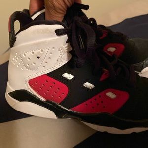 Toddler boys Red/Black/White Jordan’s size 11c… Good condition.